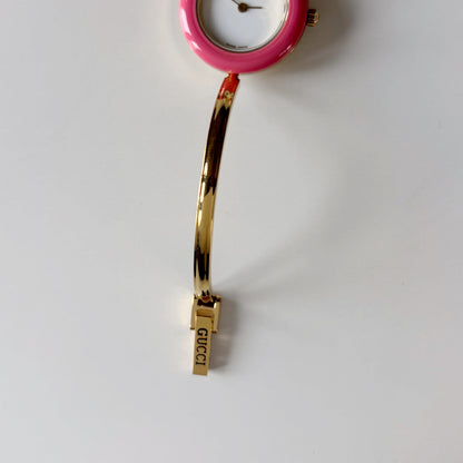 Gucci 1990s Interchangeable Bezel Gold Plated Bangle Watch with case, 12 bezels