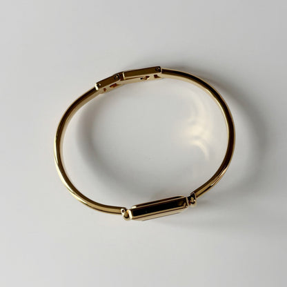 Gucci 1990s Square Dial Gold Plated Bangle Watch