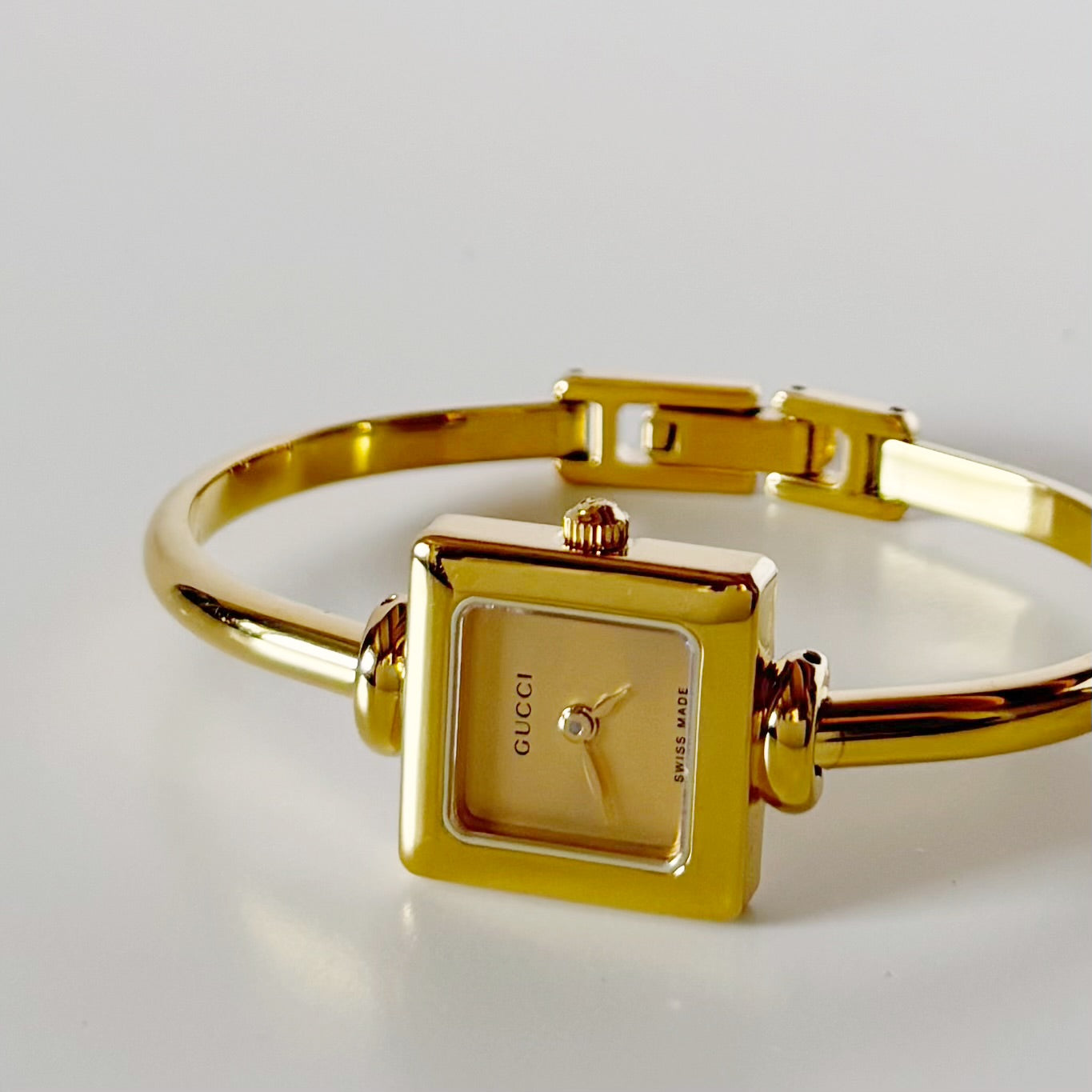 Gucci 1990s Square Dial Gold Plated Bangle Watch