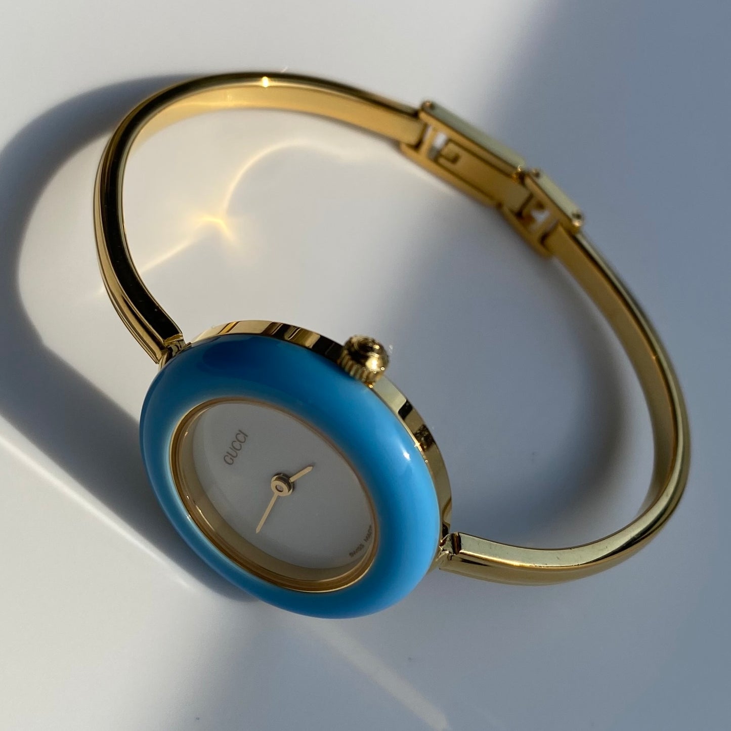 Gucci 1990s Interchangeable Bezel Gold Plated Bangle Watch with 12 bezels, case