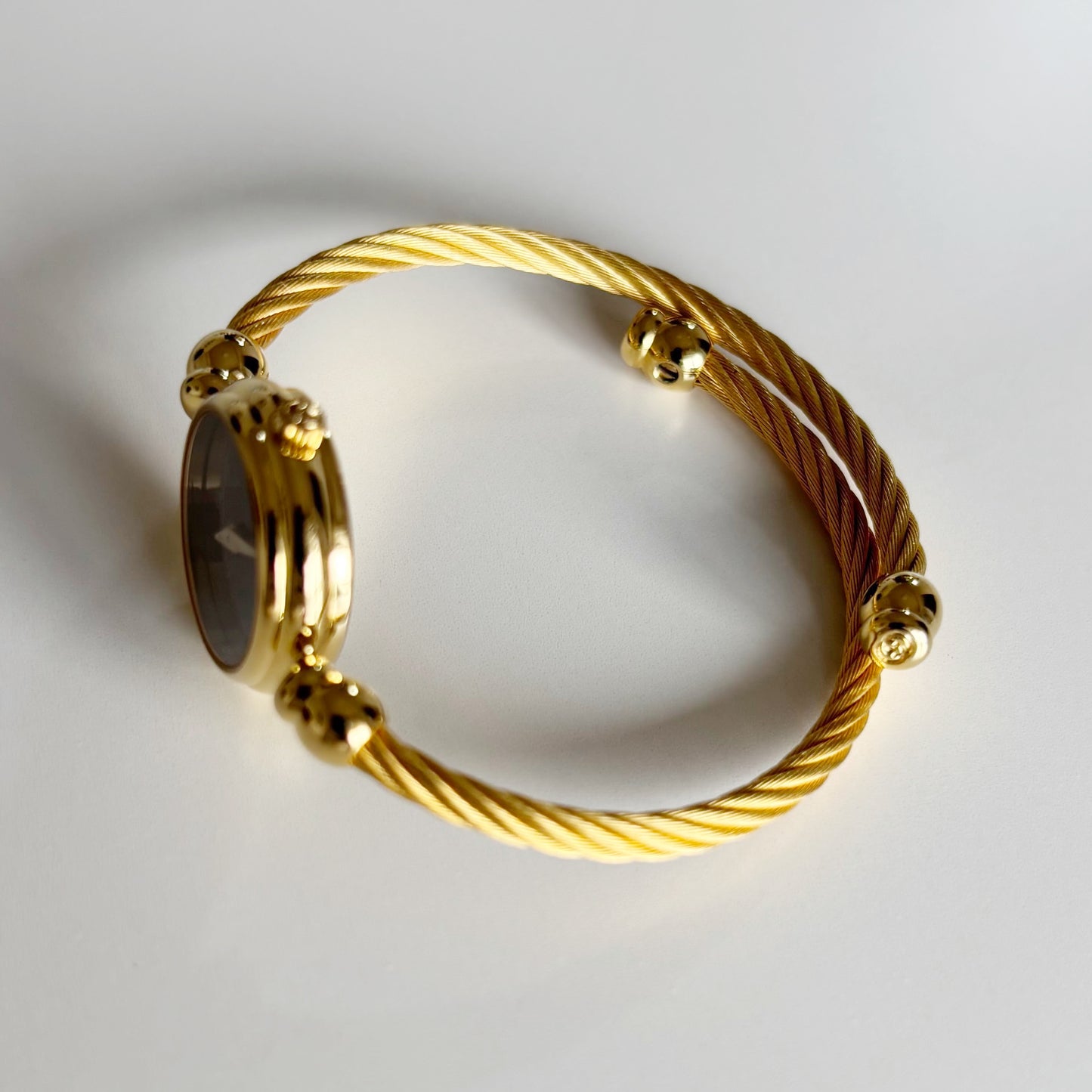 Gucci 1990s Black Dial Gold Plated Cable Band Bangle Watch