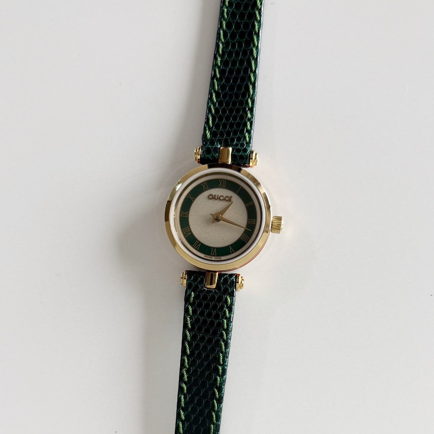 Gucci 1990s Round Dial Green Gold Plated Watch