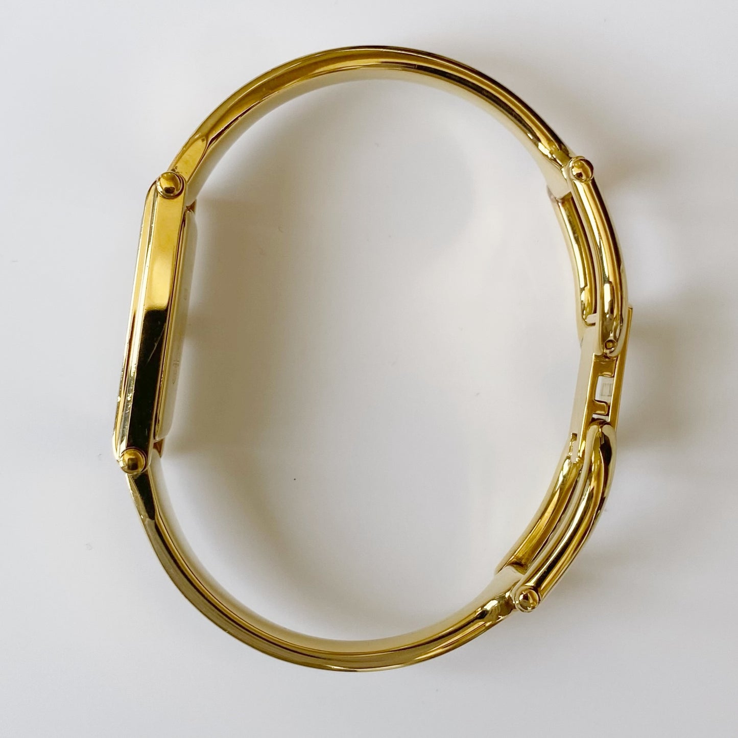 Gucci 1990s Rectangular Gold Plated Bangle Watch