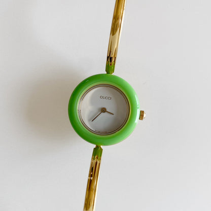 Gucci 1990s Interchangeable Bezel Gold Plated Bangle Watch with 12 bezels, case (Small)