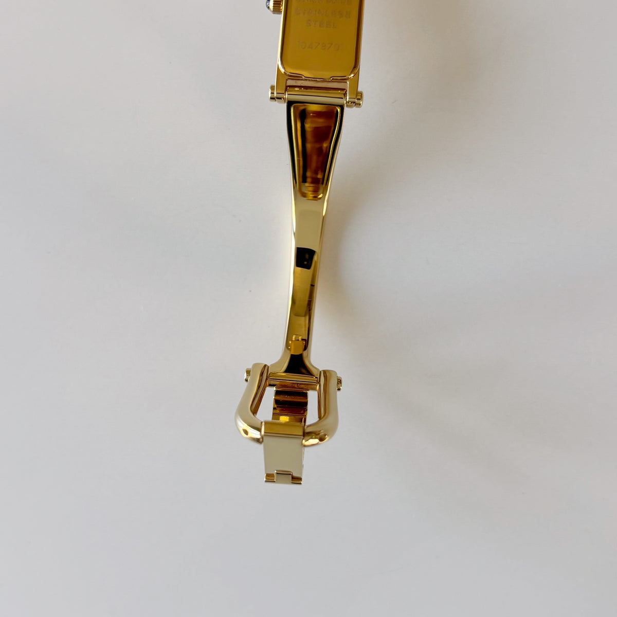 Gucci 1990s Rectangular Gold Dial Gold-Plated Watch