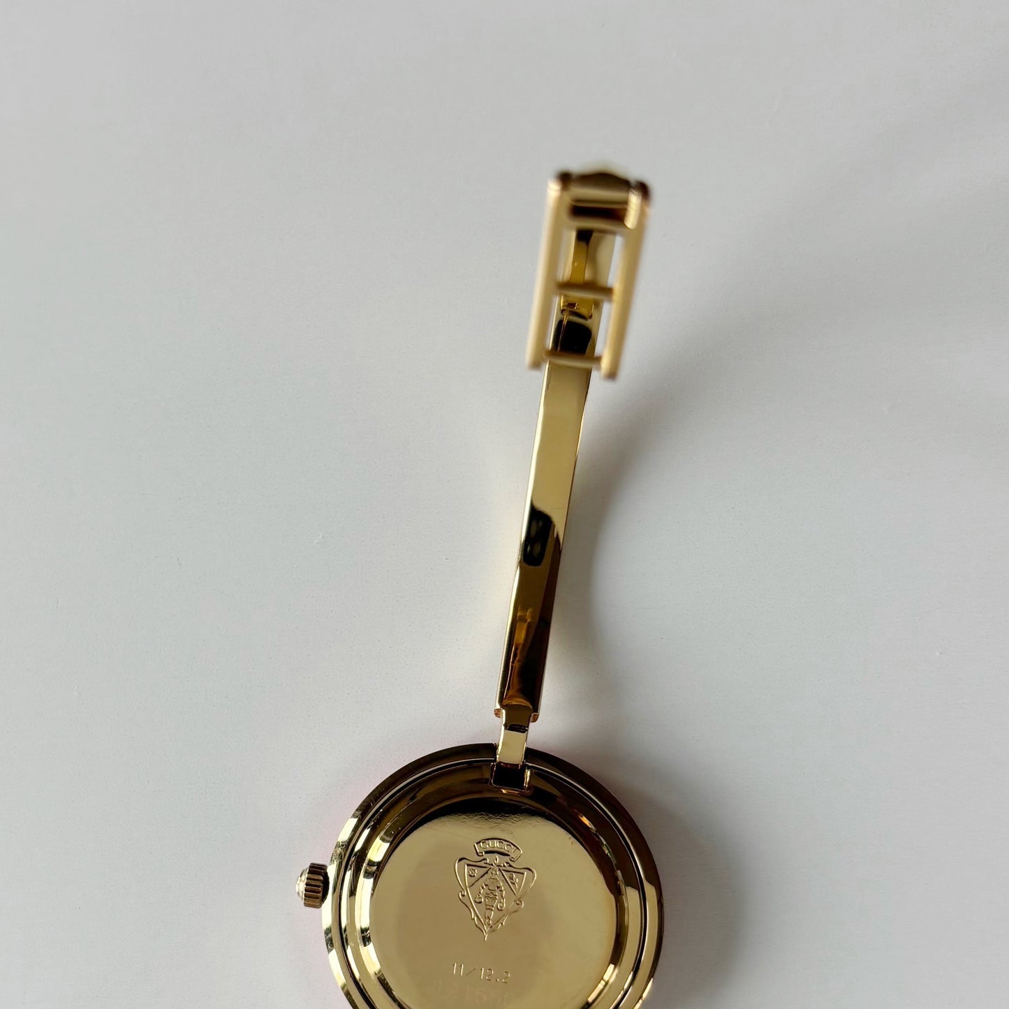 Gucci 1990s Interchangeable Bezel Gold Plated Bangle Watch with case, 12 bezels