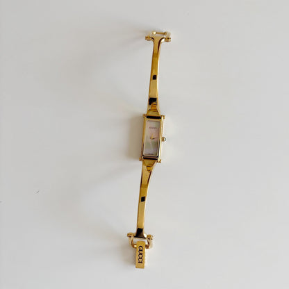 Gucci 1990s Seashell Dial Rectangular Gold Plated Bangle Watch