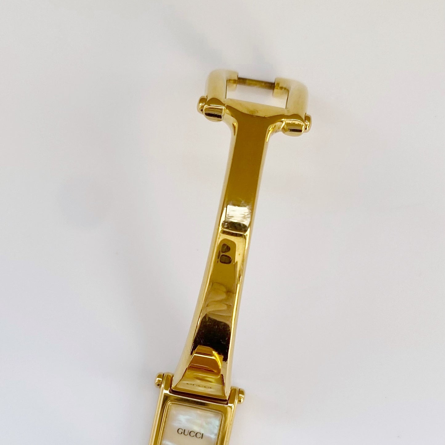 Gucci 1990s Rectangular Seashell Dial Gold Plated Bangle Watch