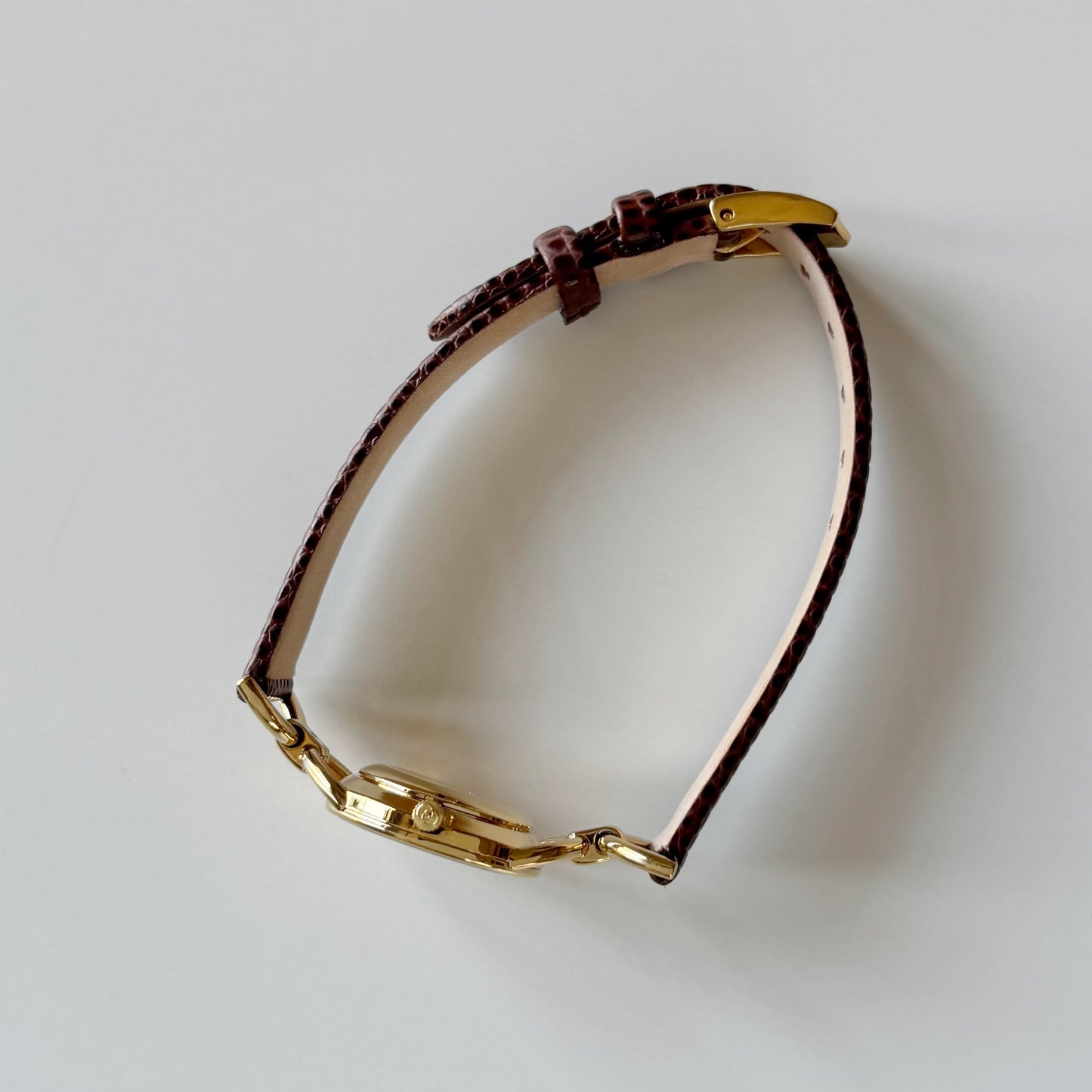 Gucci 1990s Round Cream Dial Horsebit Gold Plated Watch