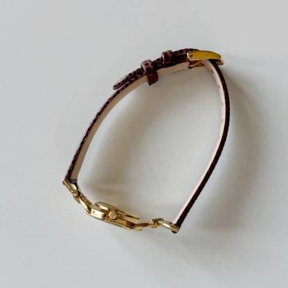 Gucci 1990s Round Cream Dial Horsebit Gold Plated Watch