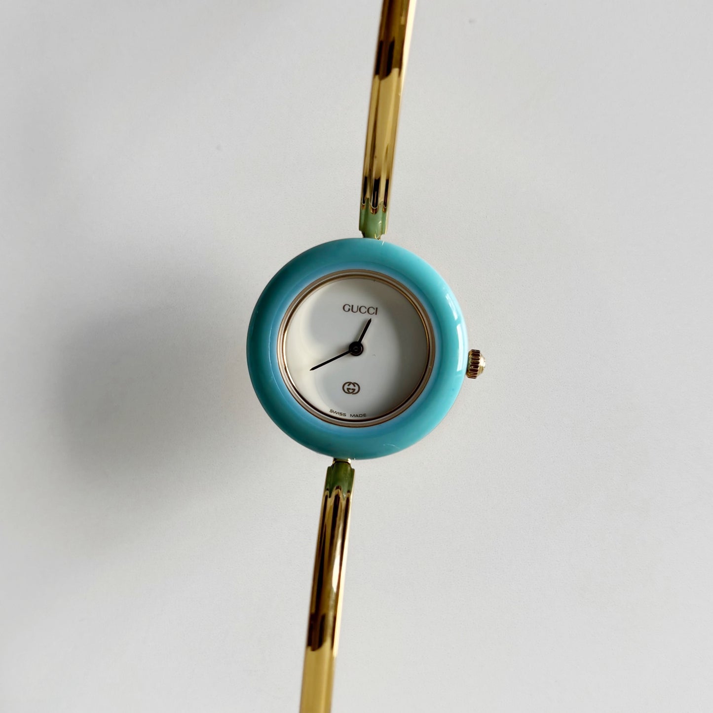 Gucci 1990s Interchangeable Bezel Gold Plated Bangle Watch with 12 bezels, case
