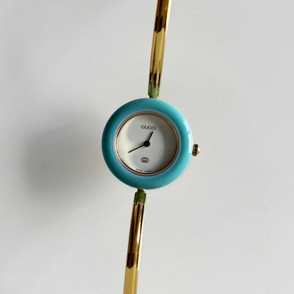 Gucci 1990s Interchangeable Bezel Gold Plated Bangle Watch with 12 bezels, case