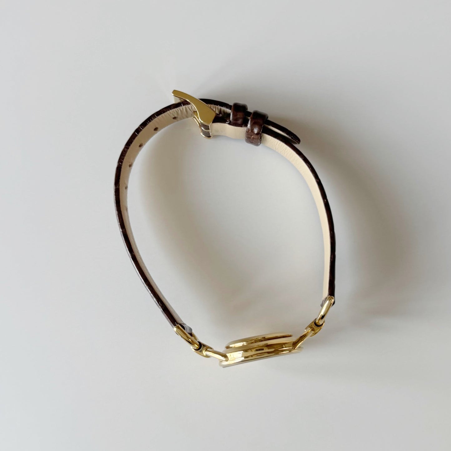 Gucci 1990s Gold Round Dial Horsebit Gold Plated Watch