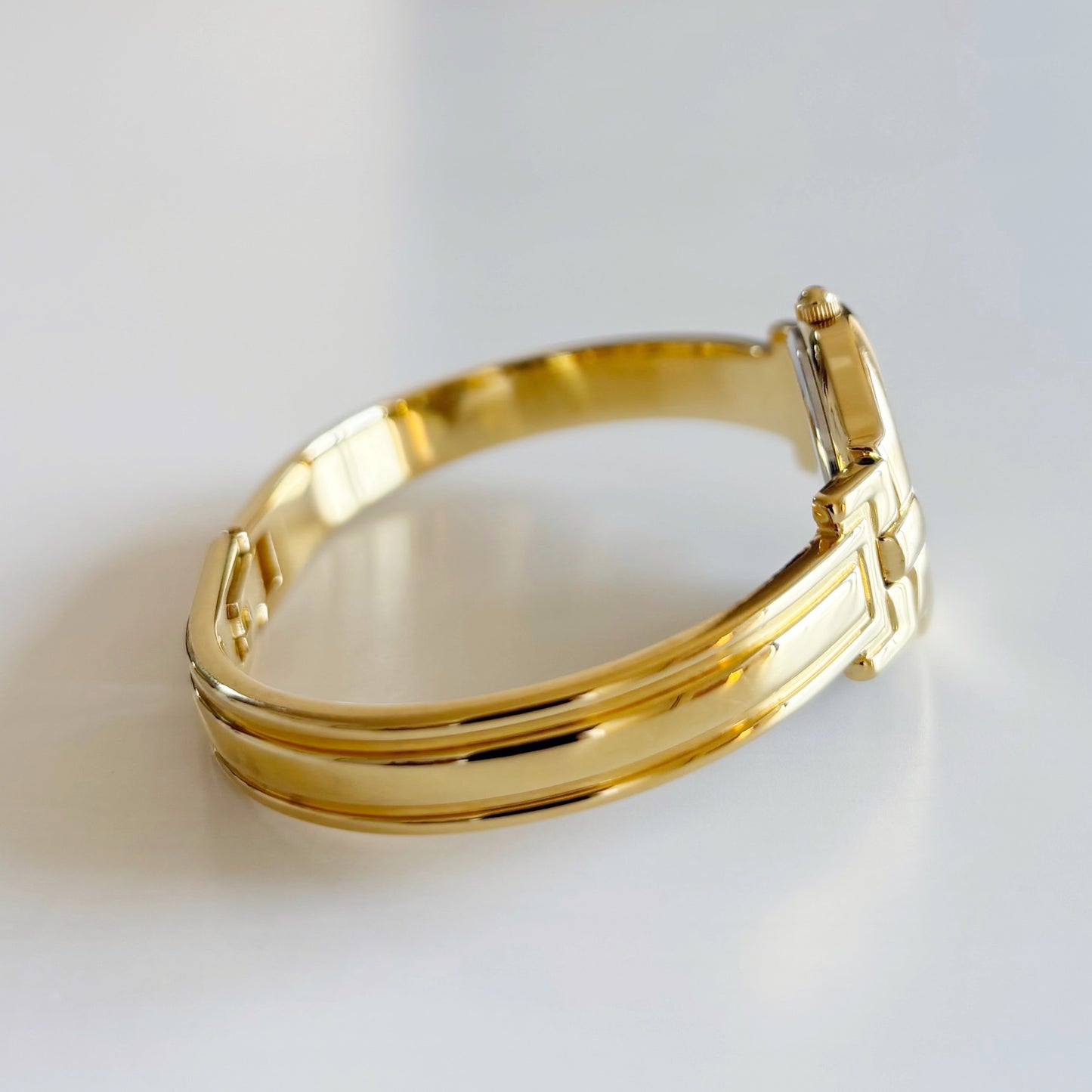 Givenchy 1990s Navy Round Dial Gold Plated Bangle Watch