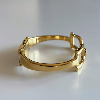 Gucci 1990s Black Dial Gold Plated Bangle Watch