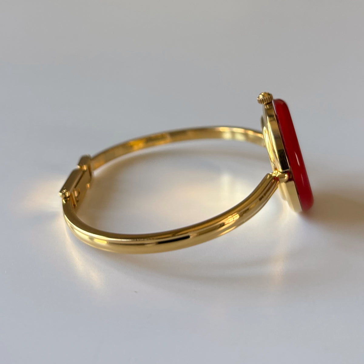 Gucci 1990s Interchangeable Bezel Gold Plated Bangle Watch with 12 bezels, case