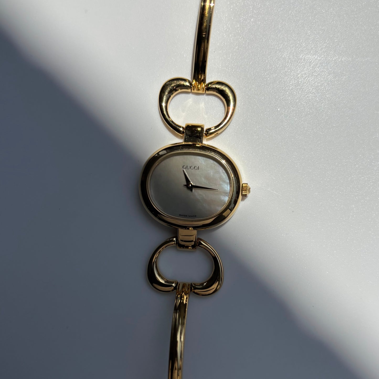 Gucci 1990s Seashell Oval Dial Gold Plated Bangle Watch (Small)