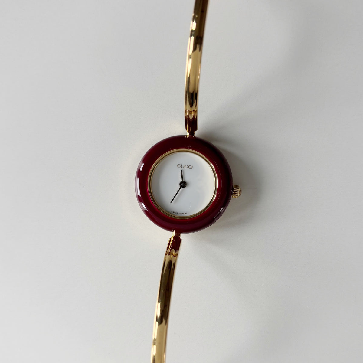 Gucci 1990s Interchangeable Bezel Gold Plated Bangle Watch with 12 bezels, case