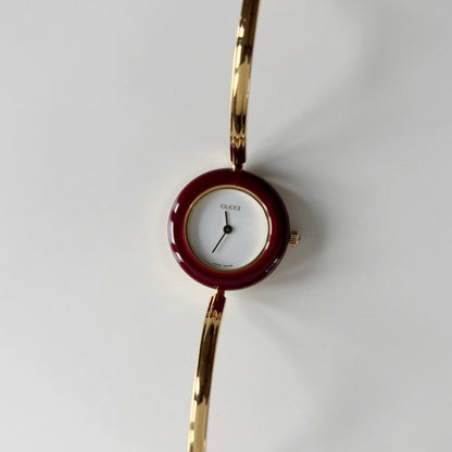 Gucci 1990s Interchangeable Bezel Gold Plated Bangle Watch with 12 bezels, case