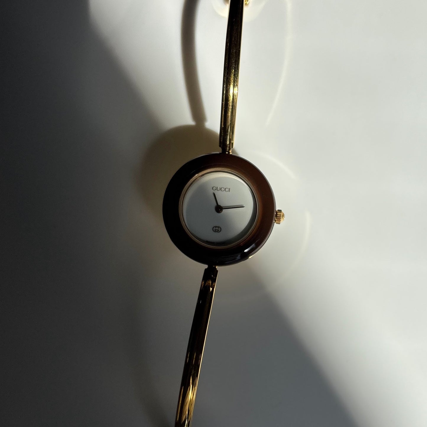 Gucci 1990s Interchangeable Bezel Gold Plated Bangle Watch with 12 bezels, case