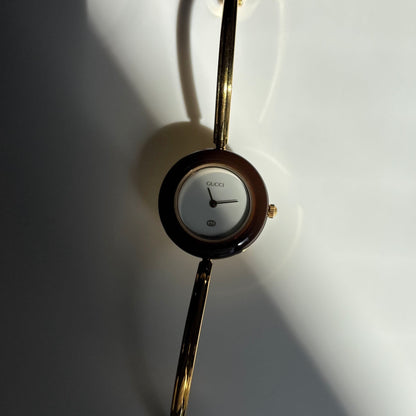 Gucci 1990s Interchangeable Bezel Gold Plated Bangle Watch with 12 bezels, case