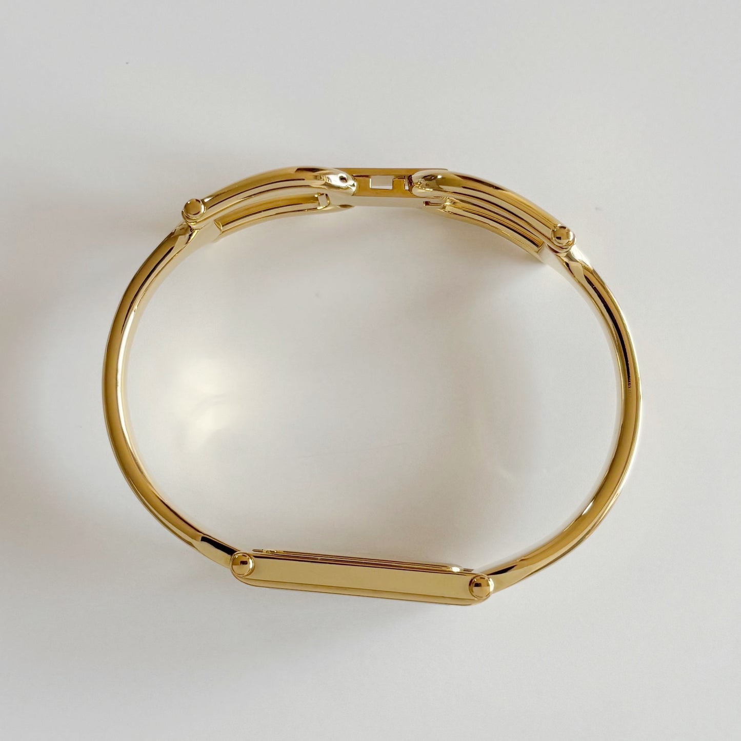 Gucci 1990s Seashell Rectangular Dial Gold Plated Bangle Watch