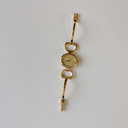Gucci 1990s Oval Gold Dial Gold Plated Bangle Watch (Small)