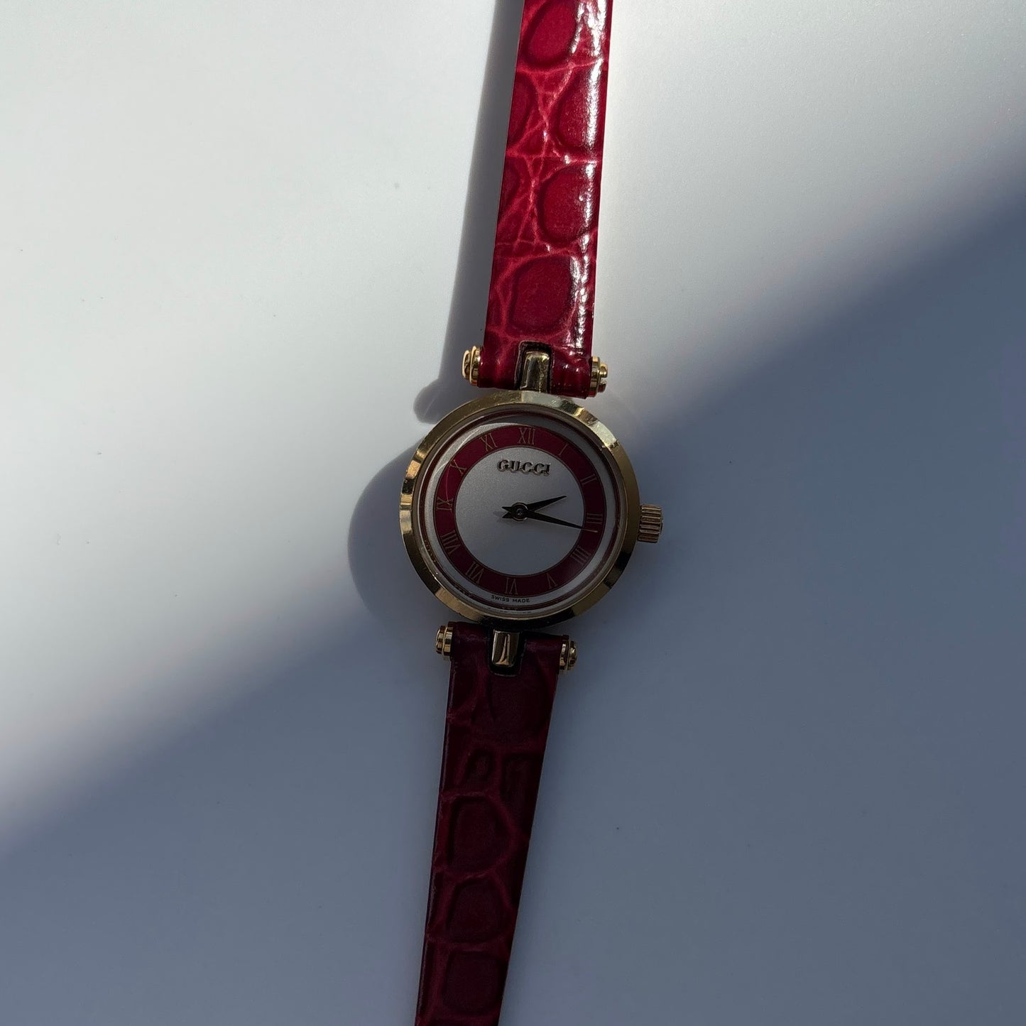 Gucci 1990s Red Dial Sherry Gold Plated Watch