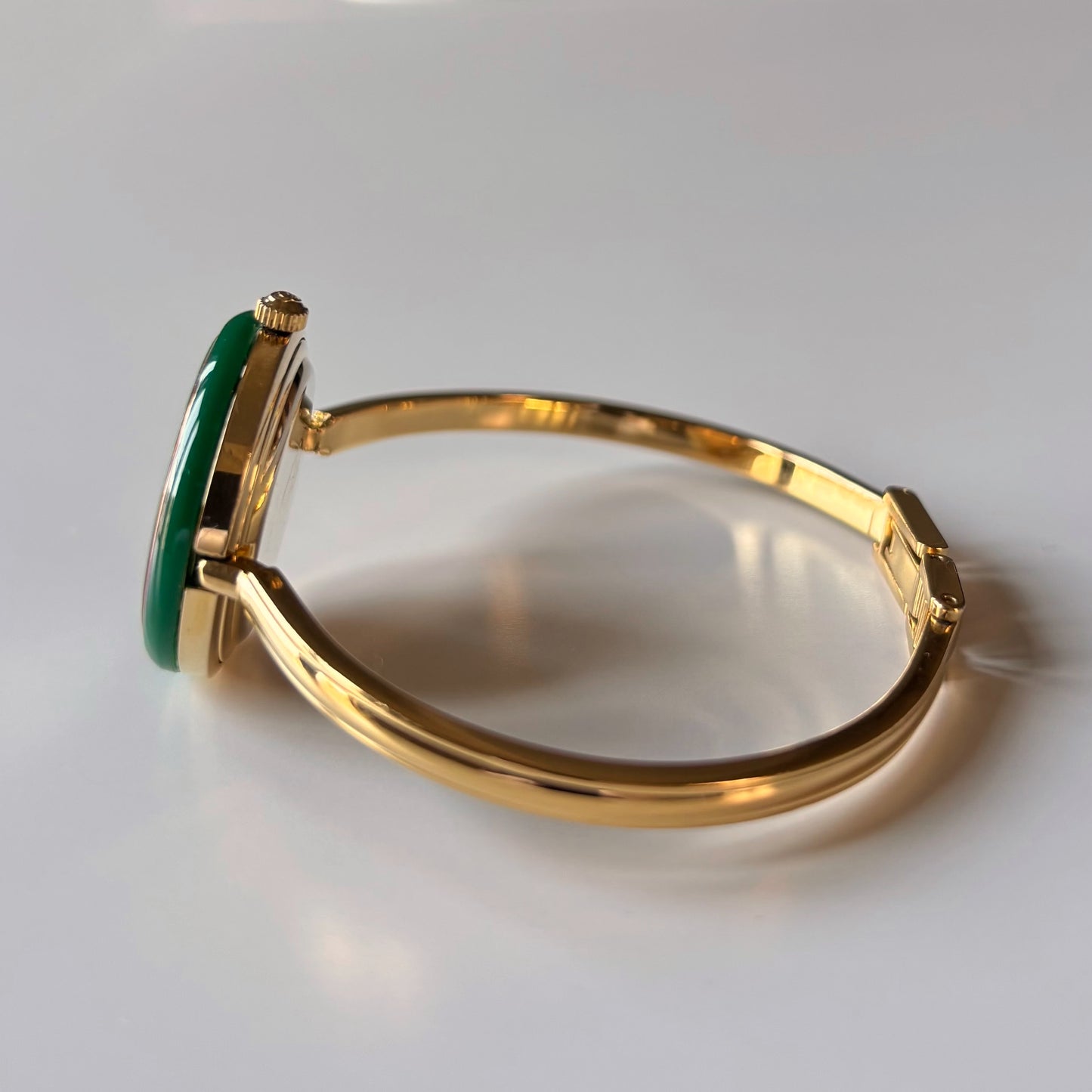 Gucci 1990s Interchangeable Bezel Gold Plated Bangle Watch with 12 bezels, case