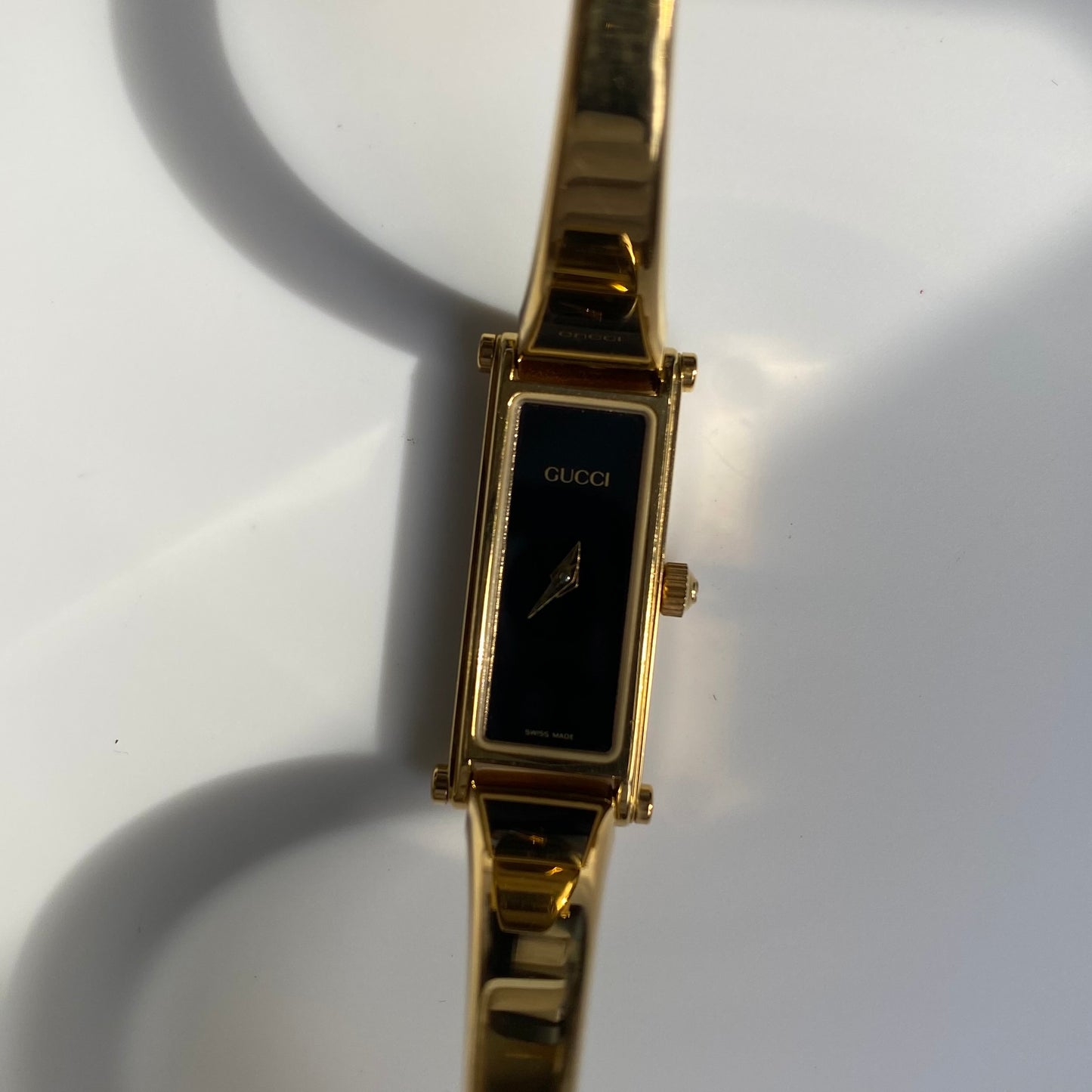 Gucci 1990s Black Dial Gold Plated Bangle Watch