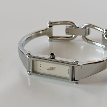 Gucci 1990s Rectangular Dial Silver Bangle Watch