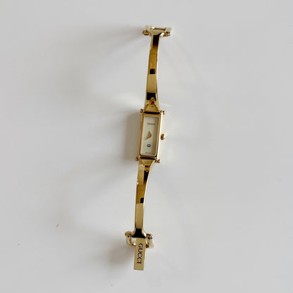 Gucci 1990s Cream Dial Rectangular Gold Plated Bangle Watch