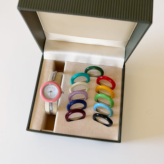 Gucci 1990s Interchangeable Bezel Stainless steel Bangle Watch with 12 bezels, case