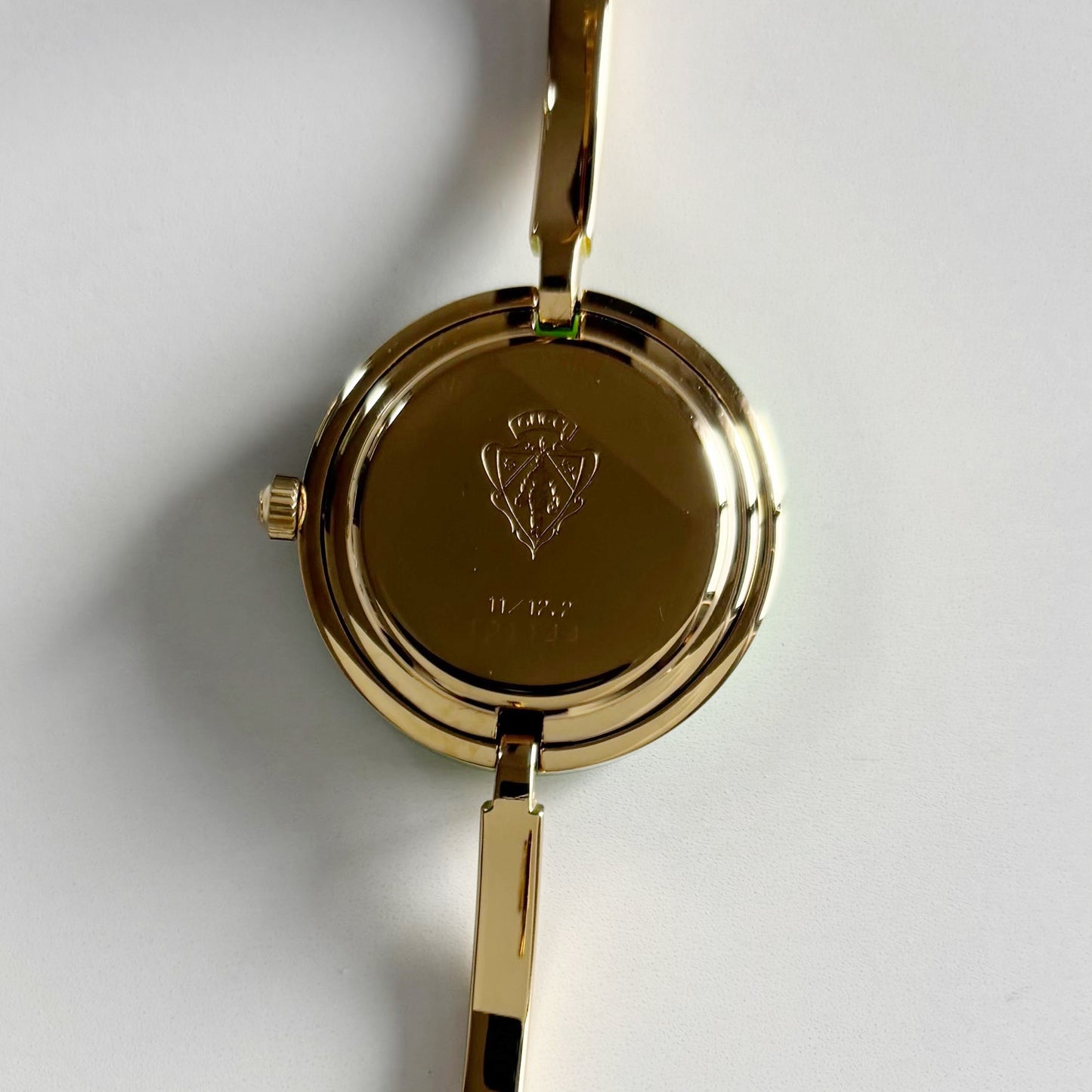 Gucci 1990s Interchangeable Bezel Gold Plated Bangle Watch with 12 bezels, case