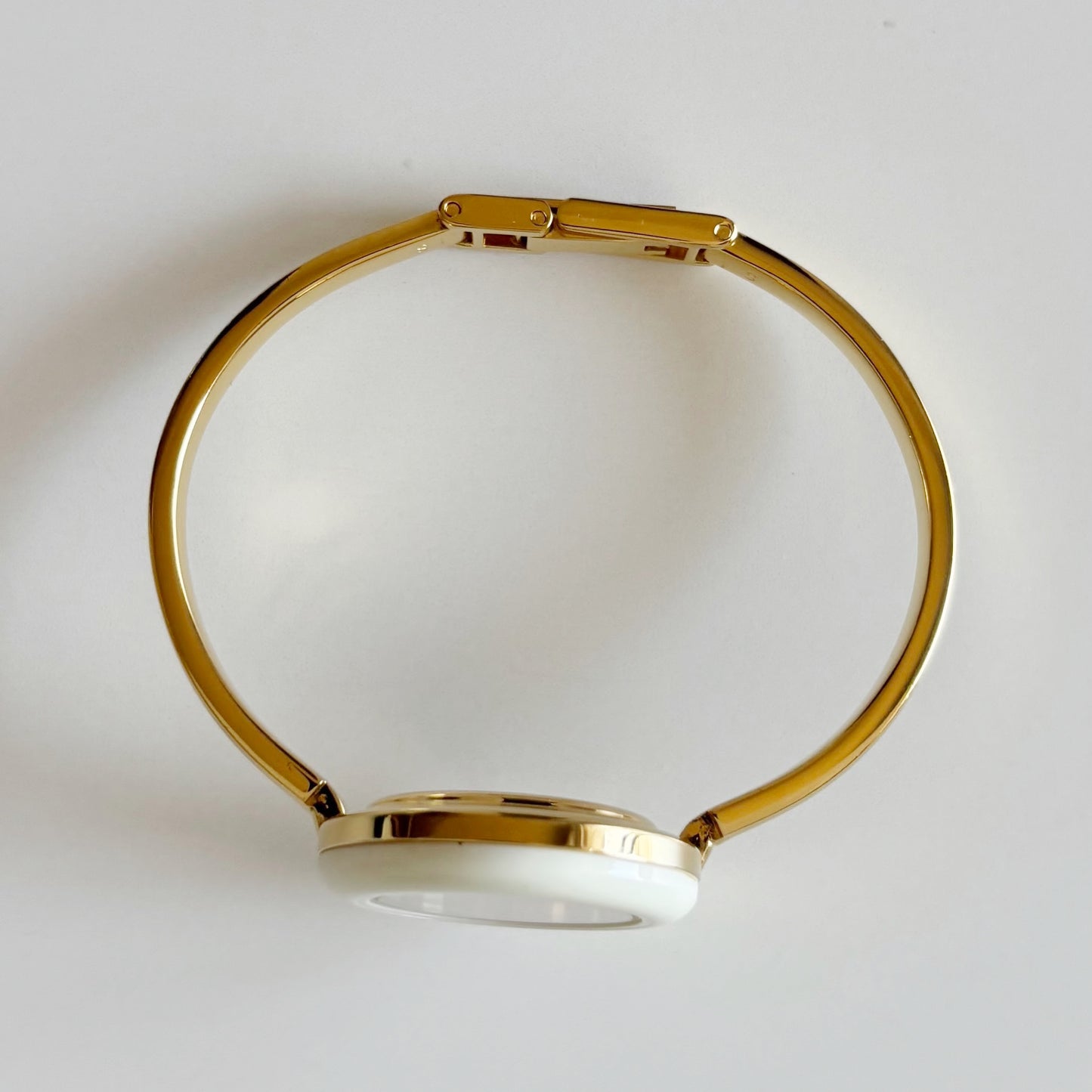 Gucci 1990s Interchangeable Bezel Gold Plated Bangle Watch with 12 bezels, case (Small)