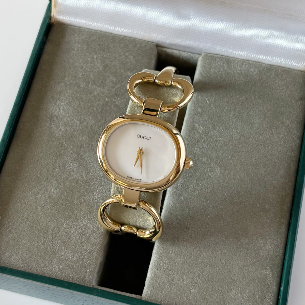 Gucci 1990s Seashell Oval Dial Gold-Plated Bangle Watch (Small)