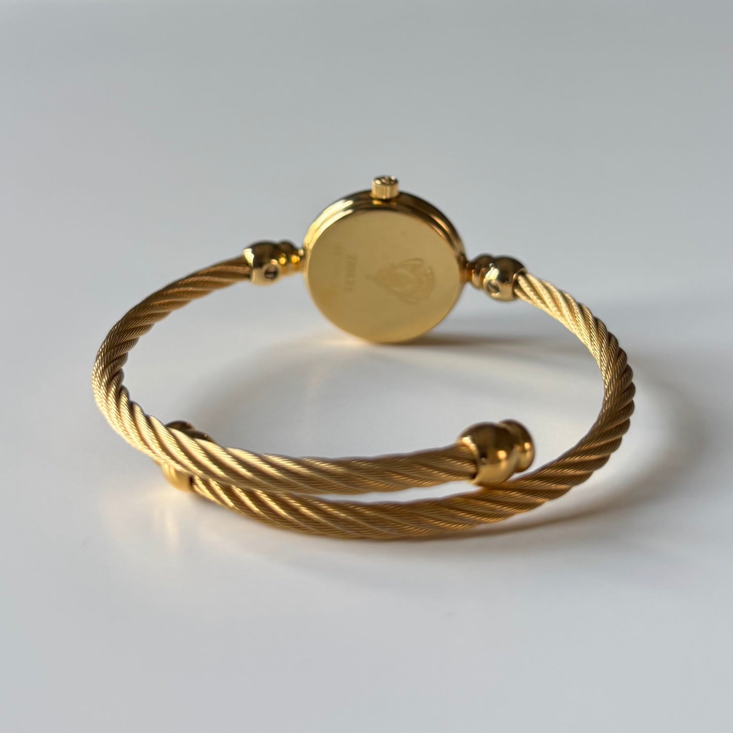 Gucci 1990s Black Dial Gold Plated Cable Bangle Watch
