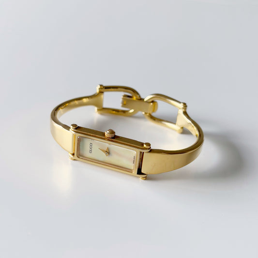 Gucci 1990s Seashell Dial Rectangular Gold Plated  Bangle Watch