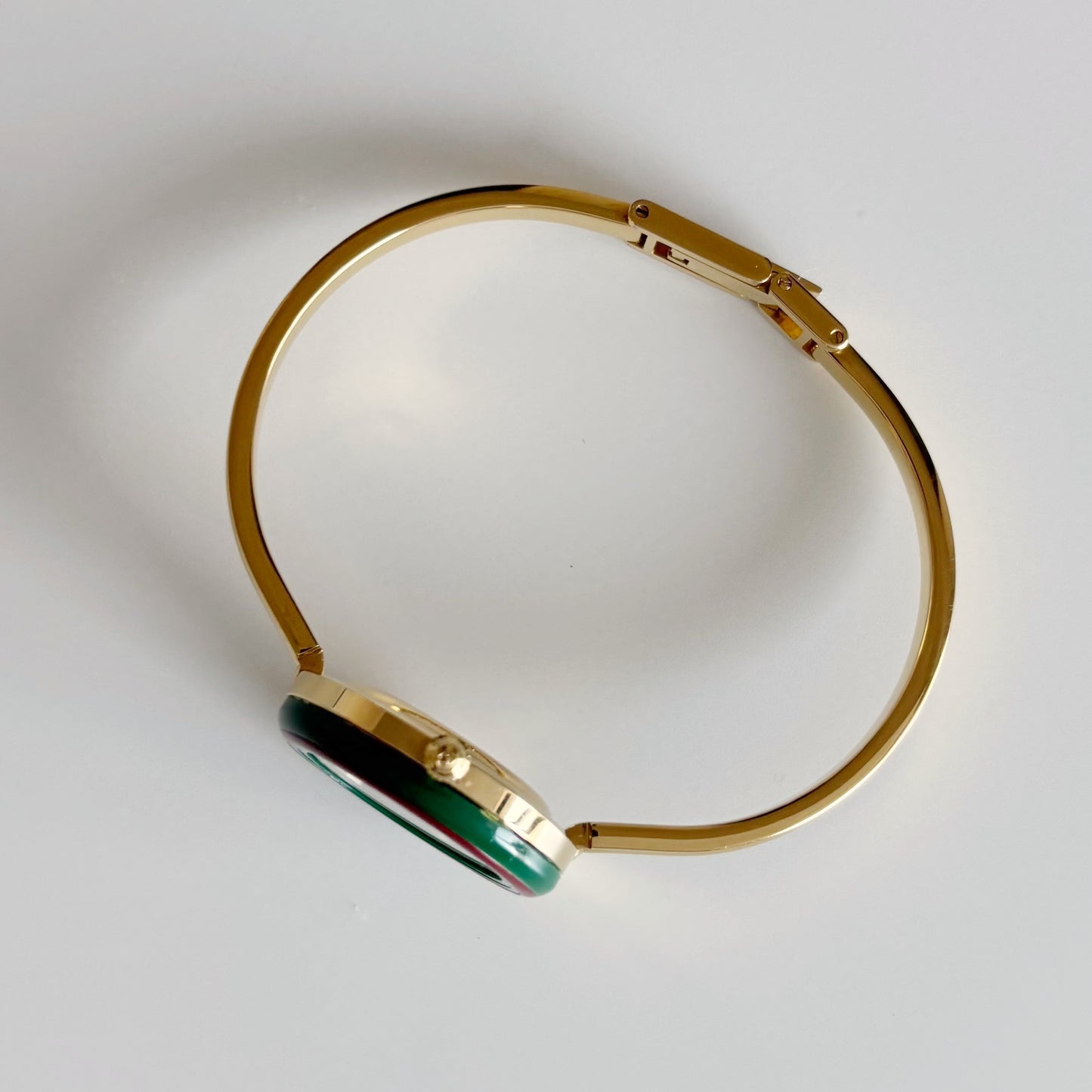 Gucci 1990s Interchangeable Bezel Gold Plated Bangle Watch with 12 bezels, case