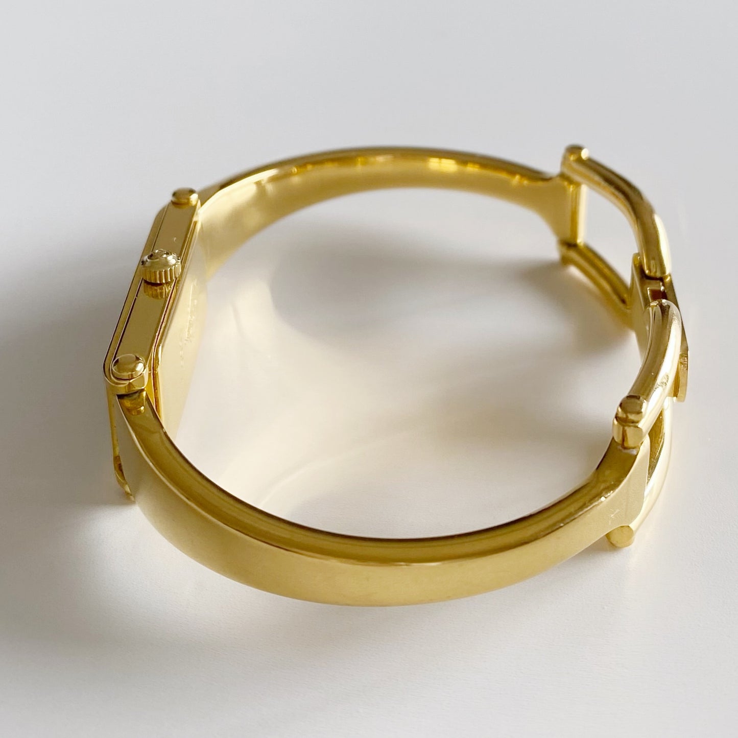 Gucci 1990s Gold Dial Rectangular  Gold Plated Bangle Watch