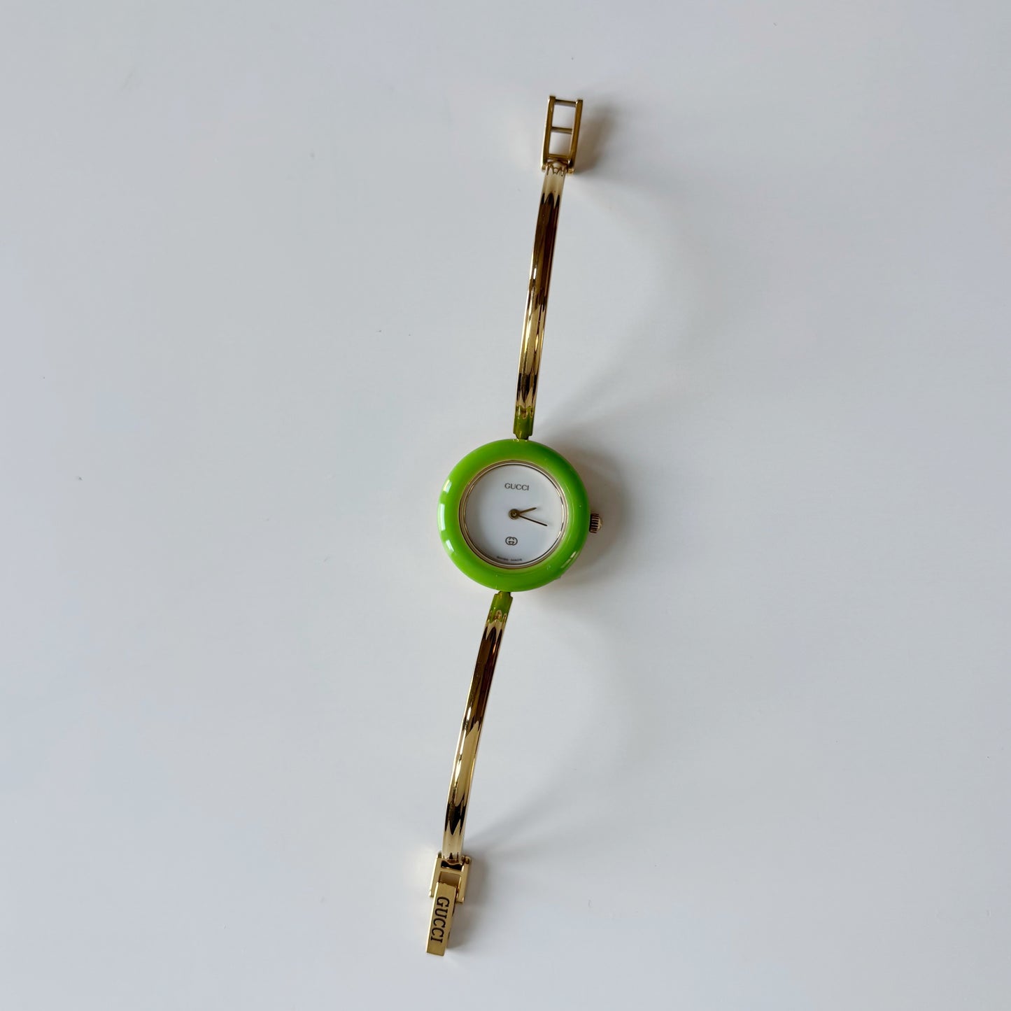 Gucci 1990s Interchangeable Bezel Gold Plated Bangle Watch with 12 bezels, case
