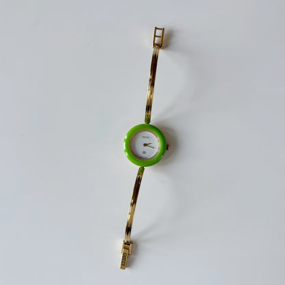 Gucci 1990s Interchangeable Bezel Gold Plated Bangle Watch with 12 bezels, case