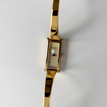 Gucci 1990s Seashell Rectangular Dial Gold Plated Bangle Watch