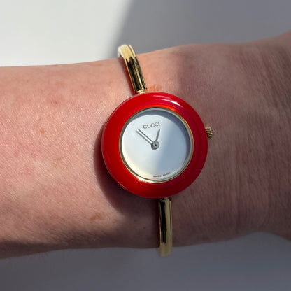 Gucci 1990s Interchangeable Bezel Gold Plated Bangle Watch with 12 bezels, case