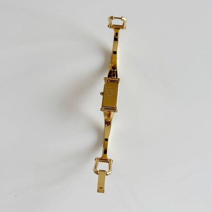 Gucci 1990s Seashell Dial Rectangular Gold Plated Bangle Watch