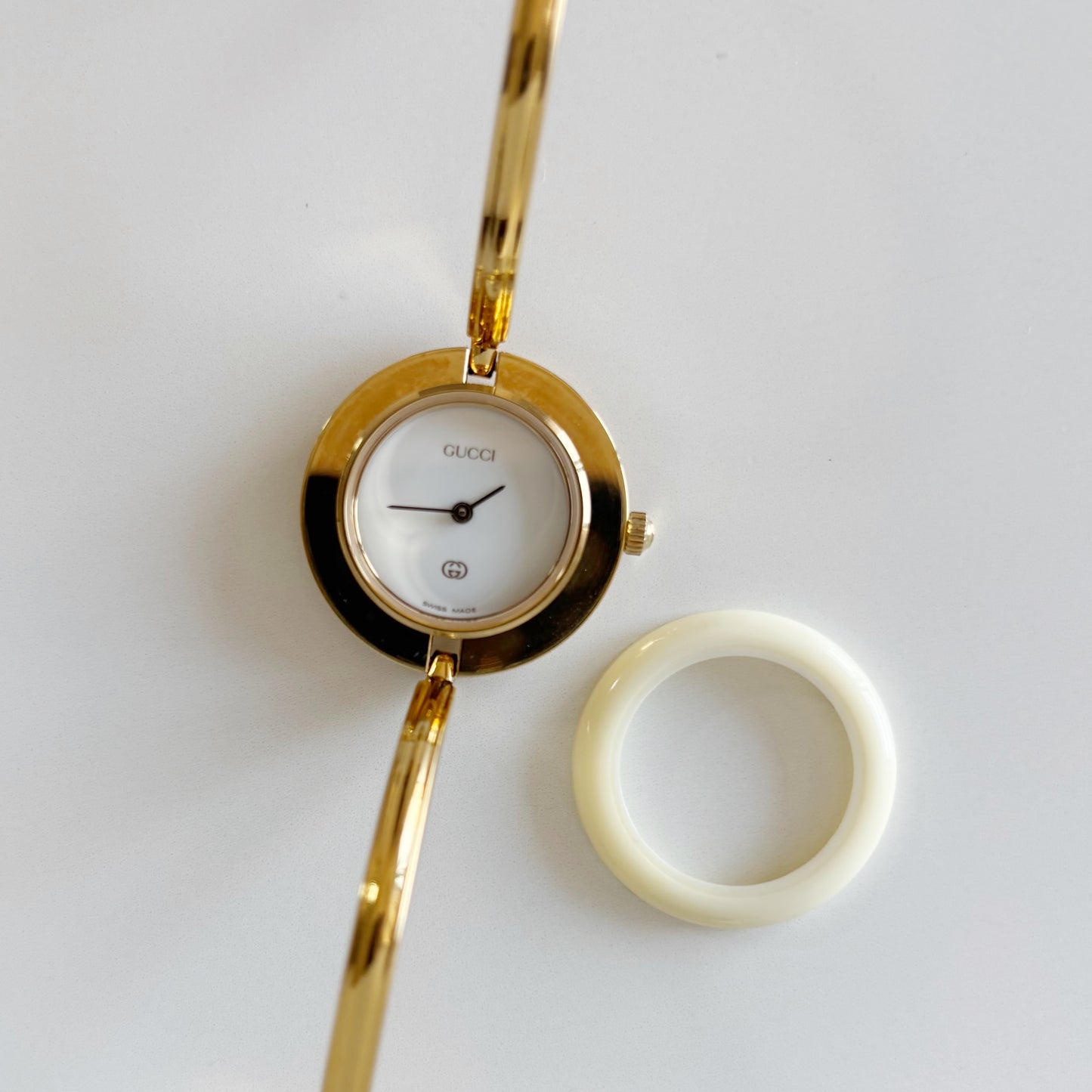 Gucci 1990s Interchangeable Bezel Gold Plated Bangle Watch with 12 bezels, case