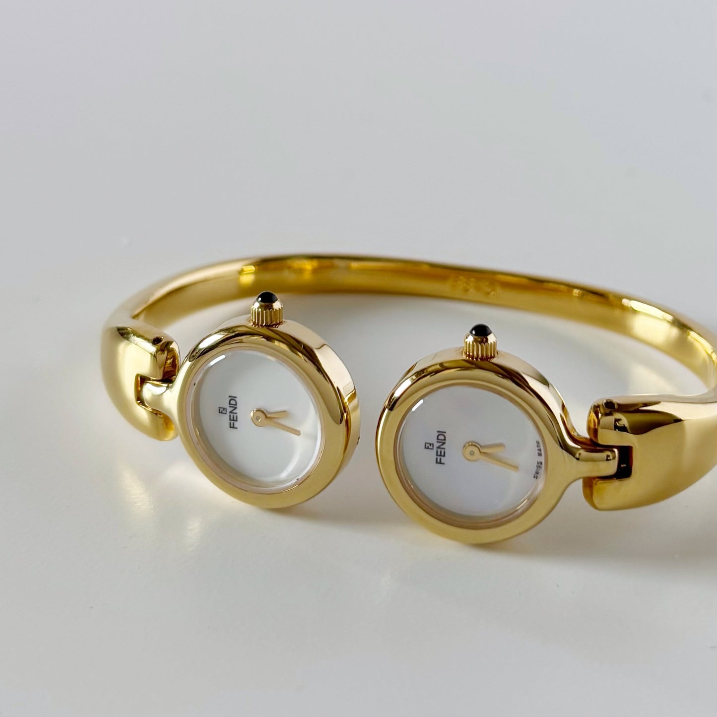 Fendi 1990s Seashell Dial Two Time Zone Gold Plated Bangle Watch