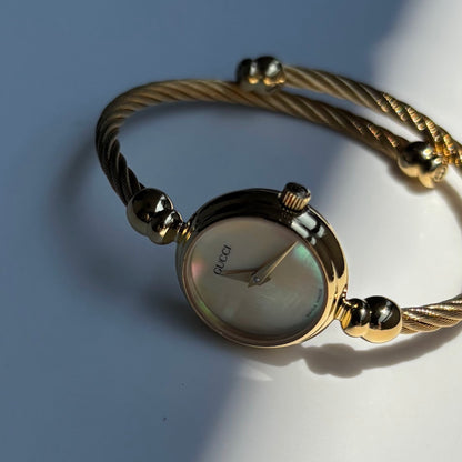 Gucci 1990s Seashell Dial Gold Plated Cable Bangle Watch