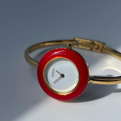 Gucci 1990s Interchangeable Bezel Gold Plated Bangle Watch with 12 bezels, case