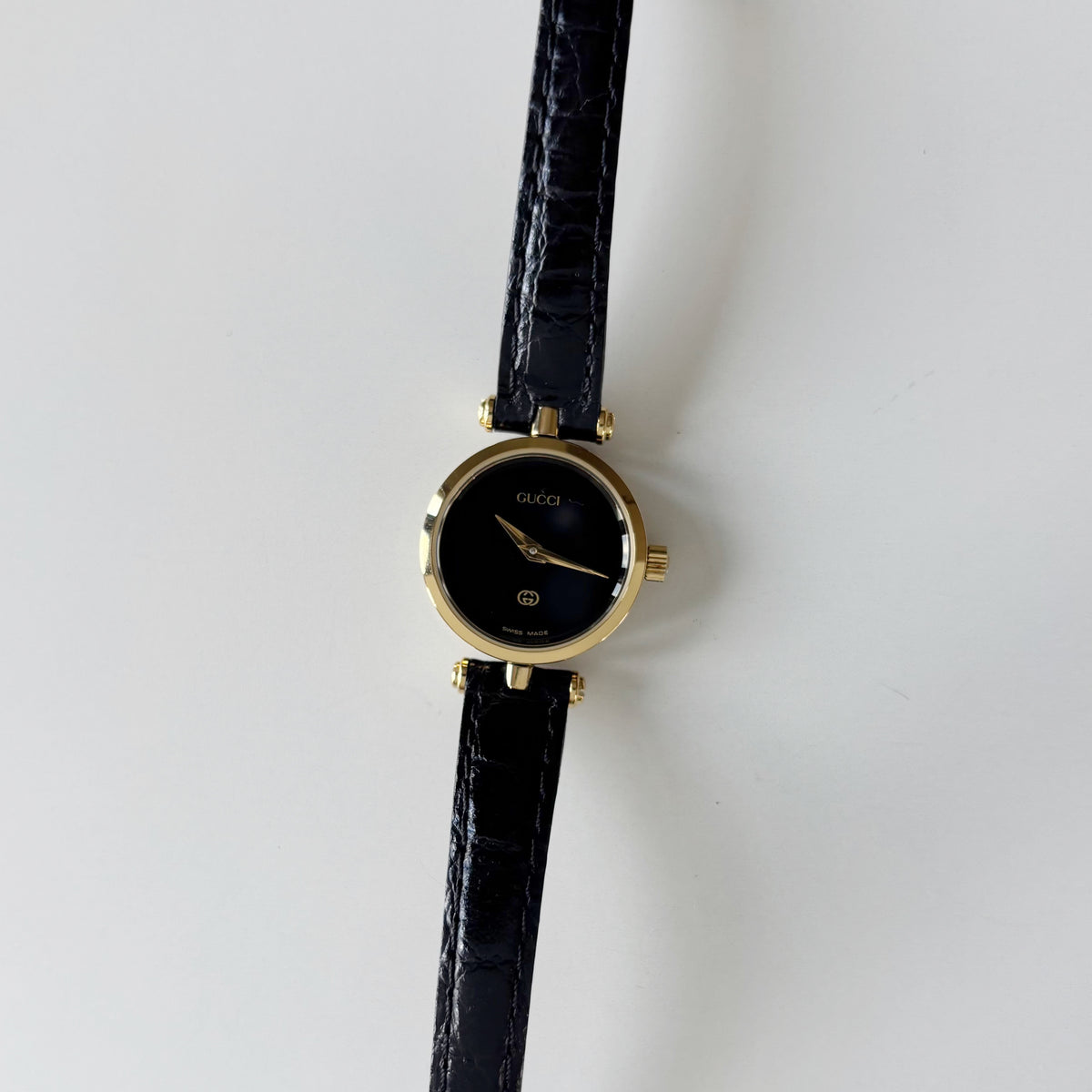 Gucci 1980s Black Dial Round Gold-Plated Watch